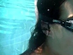 Submerged underwater with a dick inside her