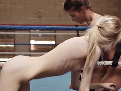 Lesbian MIF and teen enjoy strapon sex in the boxing ring