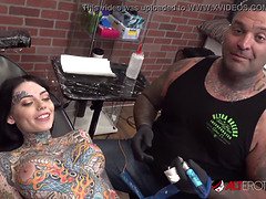 Tiger Lilly gets a forehead tattoo while nude