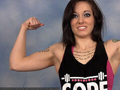 outstanding muscle nymph flexing biceps