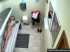 Blonde Girl Caught in Public Solarium