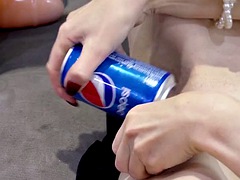 Tiffany works out her pussy with a can of Pepsi