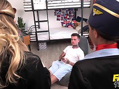 Three hot flight attendants play with a massive Danish cock in sexy foursome group