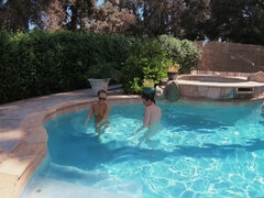 Two beautiful young babes fucking by the pool