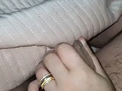 Horny stepmom gives her lucky stepson a handjob before bed