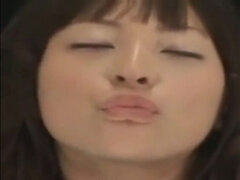 Japanese girl kissing glass